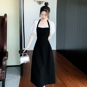 黑色拼接洋裝女春夏法式泡泡袖小眾設計赫本風露背長裙