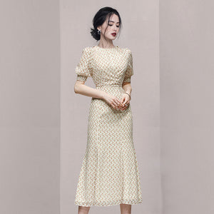 跨境2021新款女裝時尚優雅鏤空顯瘦魚尾提花雪紡印花綁帶洋裝