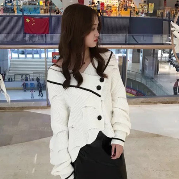 韓版秋季新品寬鬆撞色長袖花瓣鏤空針織開衫短款毛衣外套女8332